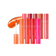 Rom&nd Juicy Lasting Tint lip tint in vibrant shade, showing the applicator and glossy finish on the lips.