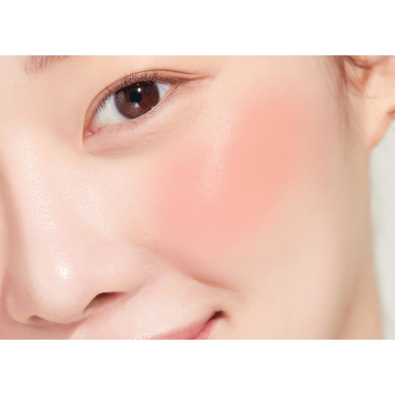 Peripera Pure Blushed Sunshine Cheek blush compact with warm peachy-pink shade and subtle shimmer for a radiant glow