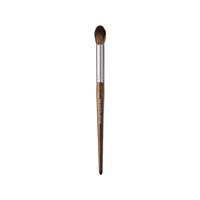 Too Cool For School Artclass Define Blender Makeup Brush with sleek handle and soft bristles for precise blending.