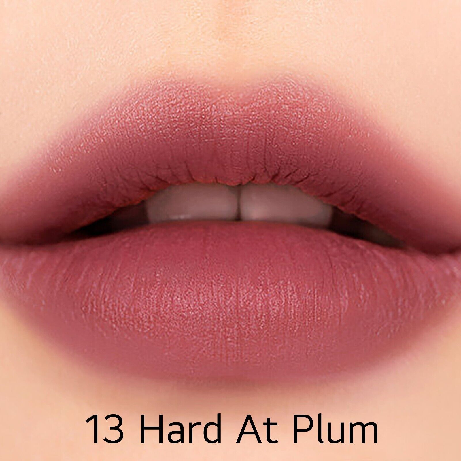 Peripera Ink Mood Matte Stick lipstick in a deep, rich shade, displayed with the matte finish and sleek packaging.