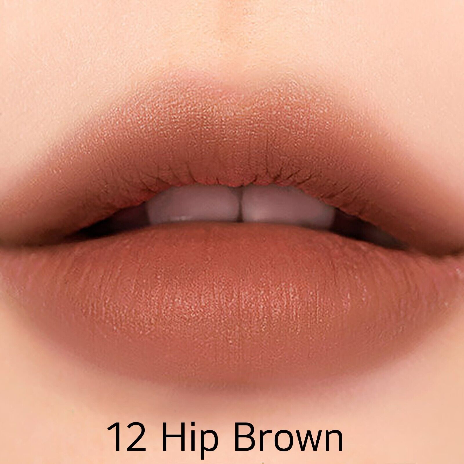 Peripera Ink Mood Matte Stick lipstick in a deep nude shade, with a smooth, matte finish and sleek packaging.