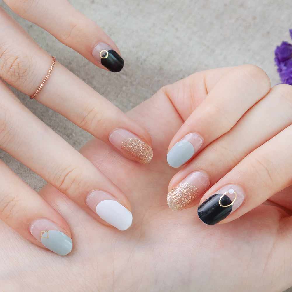 Glossy Blossom Gel Nail Strips featuring a Stone Circle French design, showcasing elegant nail art with a neutral color palette.