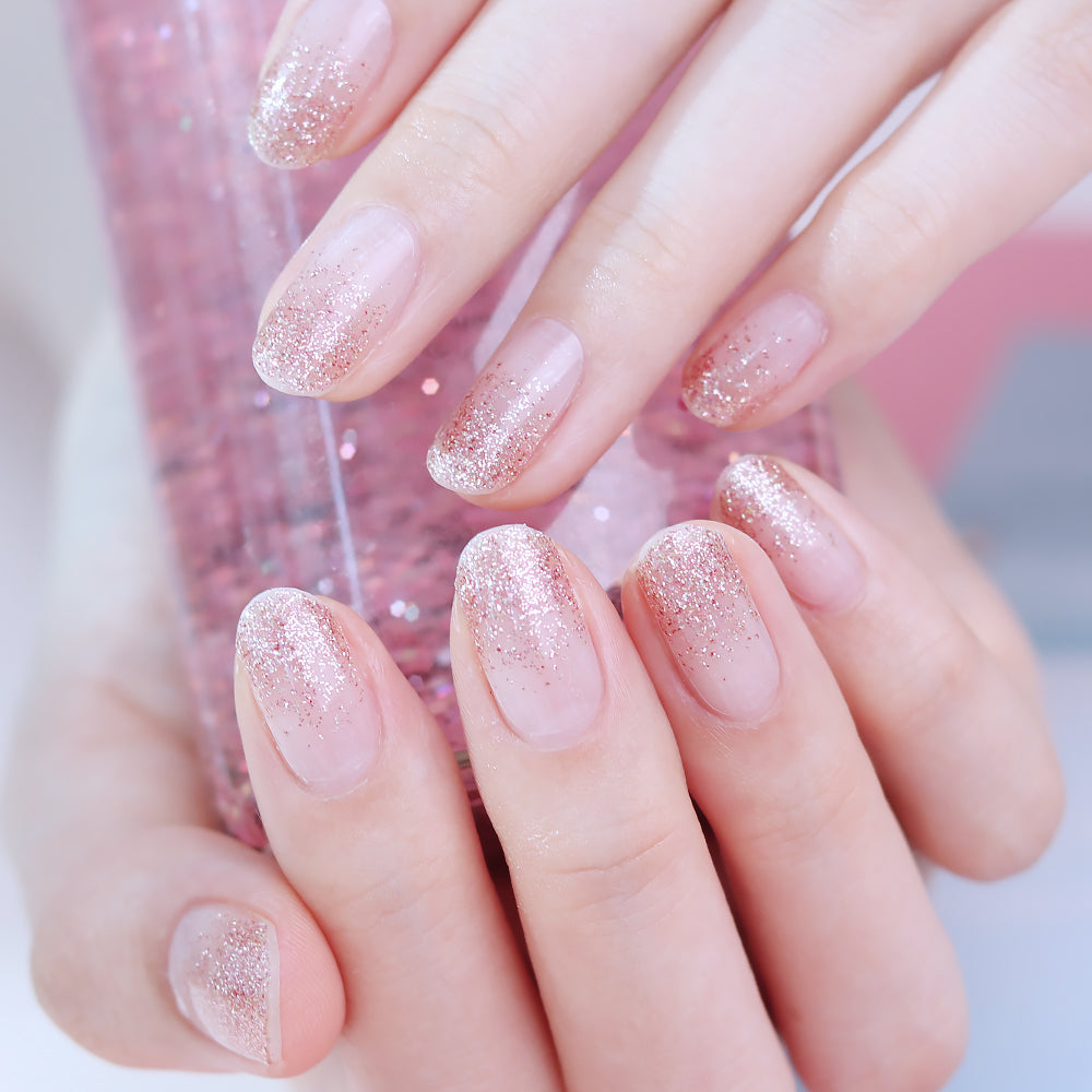 Glossy Blossom gold pink gradation gel nail strips with sparkling glitter for stylish, easy-to-apply nail art.
